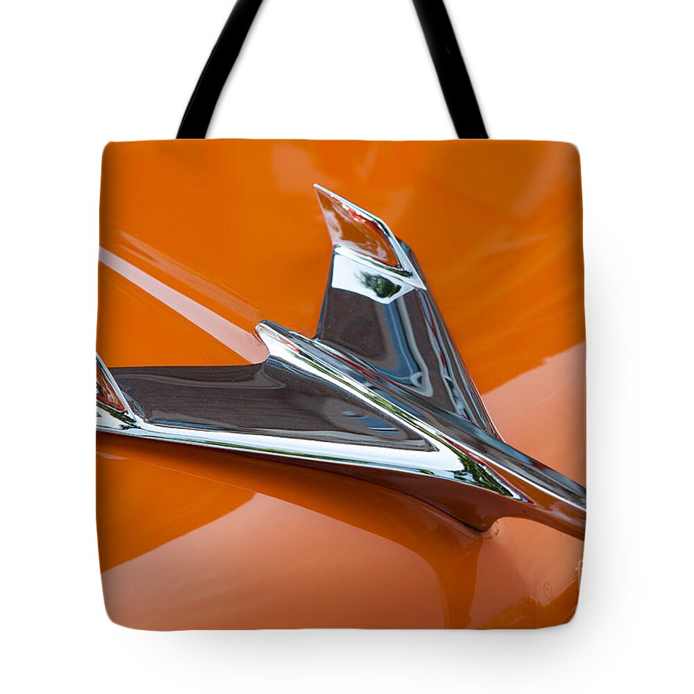 Clarence Holmes Tote Bag featuring the photograph 1956 Chevy Bel Air Hood Ornament I by Clarence Holmes