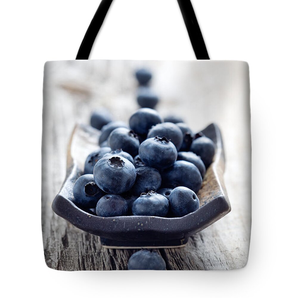 Antioxidant Tote Bag featuring the photograph Blueberries #2 by Kati Finell