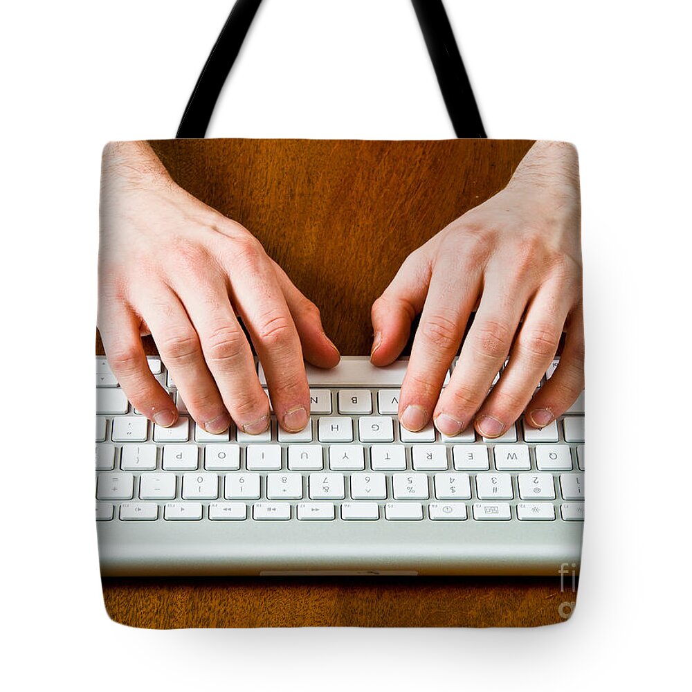 Computer Component Tote Bag featuring the photograph Typing On A Wireless Keyboard #3 by Photo Researchers