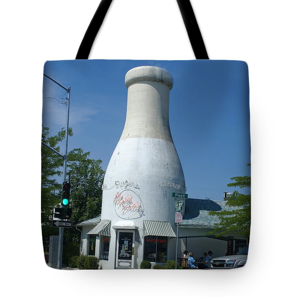 Spokane Tote Bag featuring the photograph A Giant Milk Bottle in Spokane by Ben Upham III