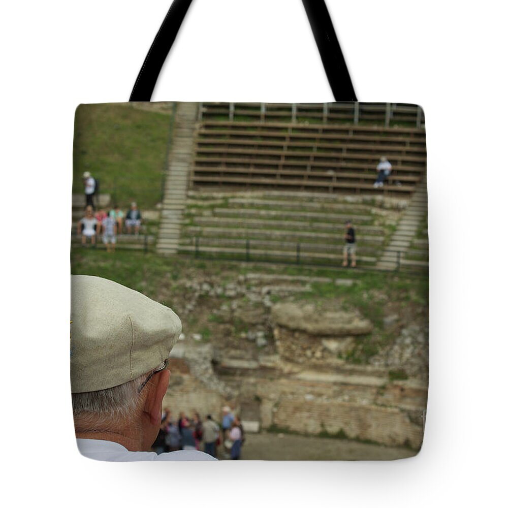 Taormina Tote Bag featuring the photograph A Tourist and the Ancient Theater of Taormina by Donato Iannuzzi