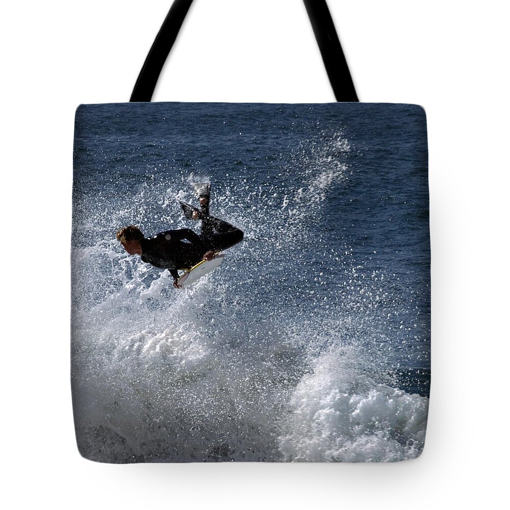 Ocean Tote Bag featuring the photograph Airborne At The Wedge by Joe Schofield