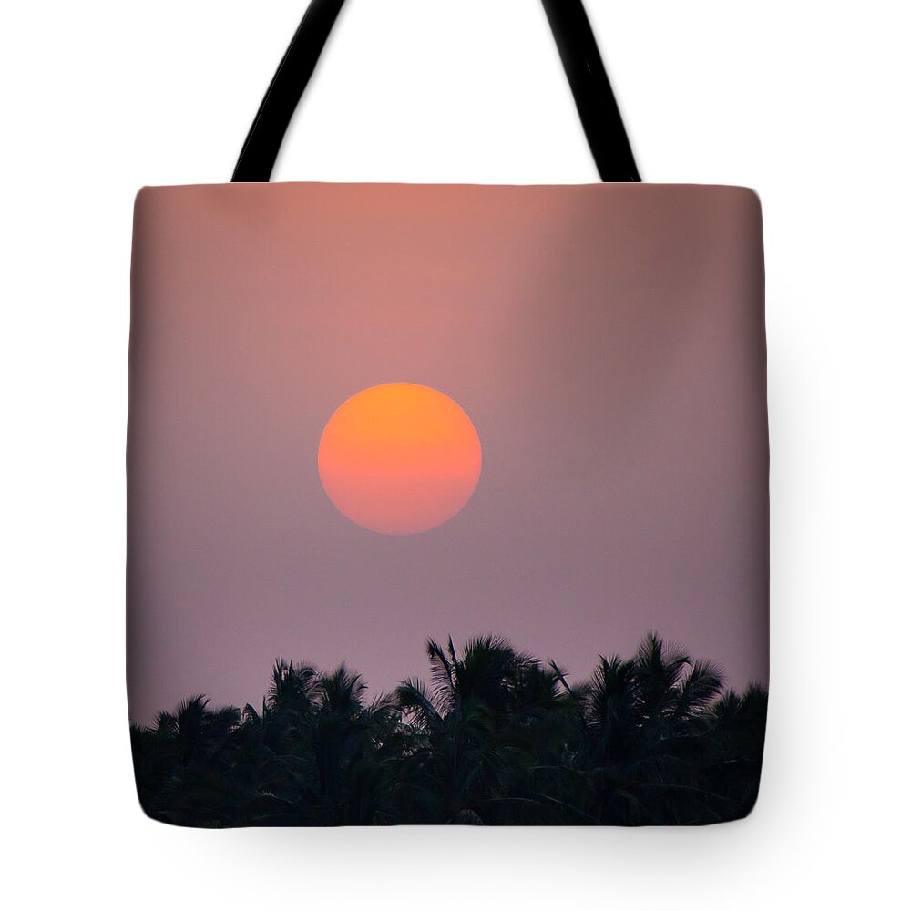 Bangalore Tote Bag featuring the photograph An old passes a new day arrives by SAURAVphoto Online Store