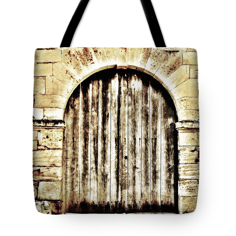 Door Tote Bag featuring the photograph Ancient Facade by Paul Topp