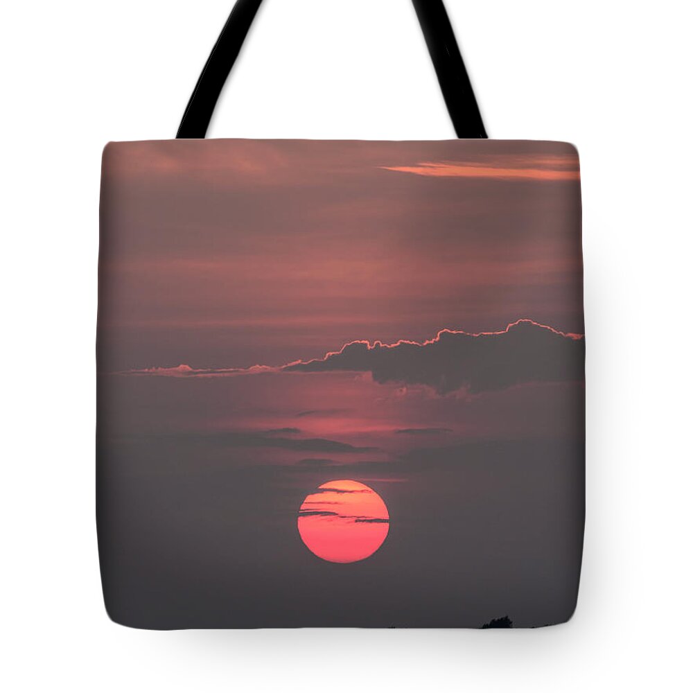  Silhouette Tote Bag featuring the photograph Another day down by Mark Papke