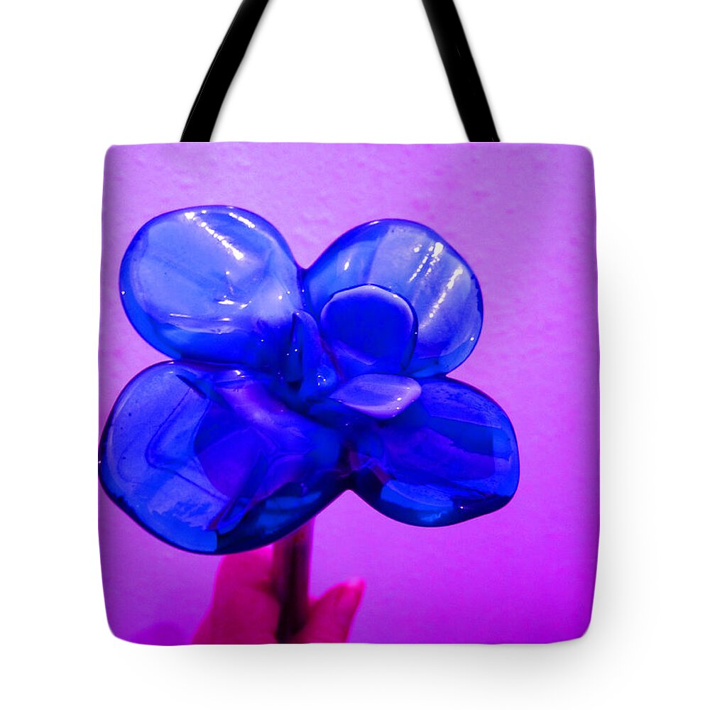 Handmade Glass Of Blue Tote Bag featuring the photograph Blue Glass Purple Wall Pink Hand by Kym Backland