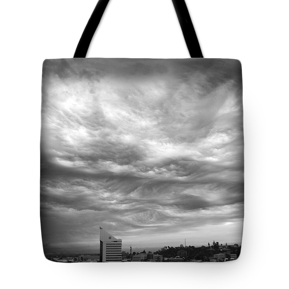 Clouds Tote Bag featuring the photograph Brewing Sky by Robert Caddy