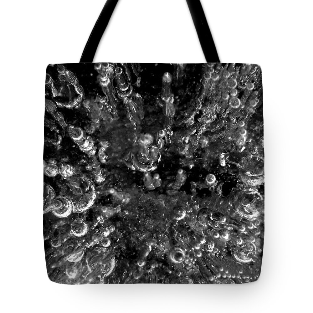 Ice Tote Bag featuring the photograph Bubble towers trapped in ice macro image by Adam Long