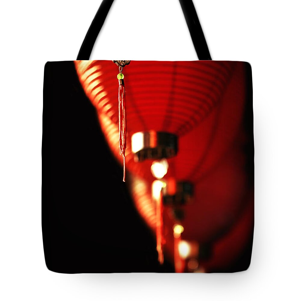 Red Tote Bag featuring the photograph Chinese Whispers by Evelina Kremsdorf
