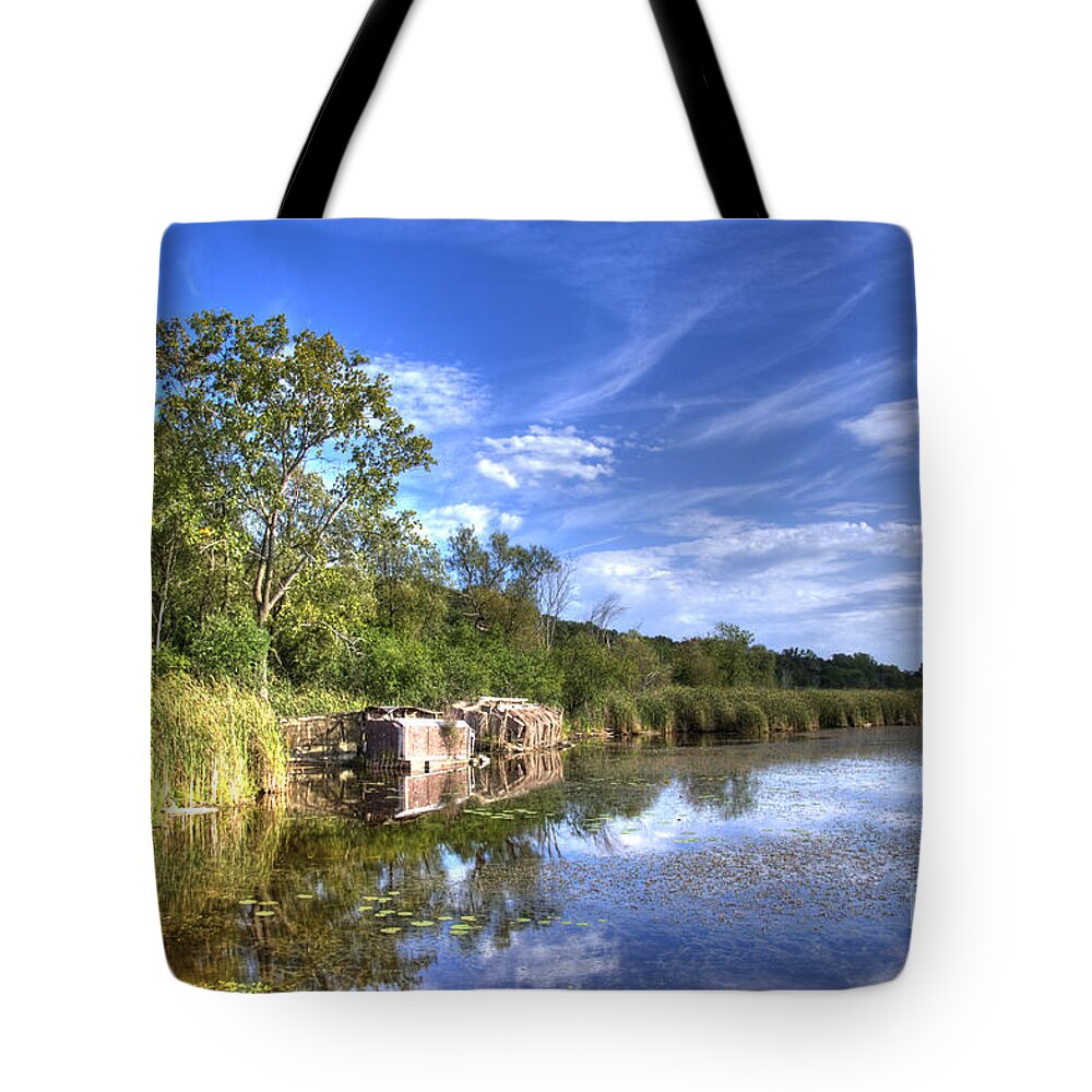 Swamp Tote Bag featuring the photograph Clouds in the water by Dejan Jovanovic