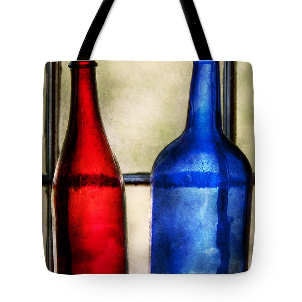 Wine Tote Bag featuring the photograph Collector - Bottles - Two empty wine bottles by Mike Savad