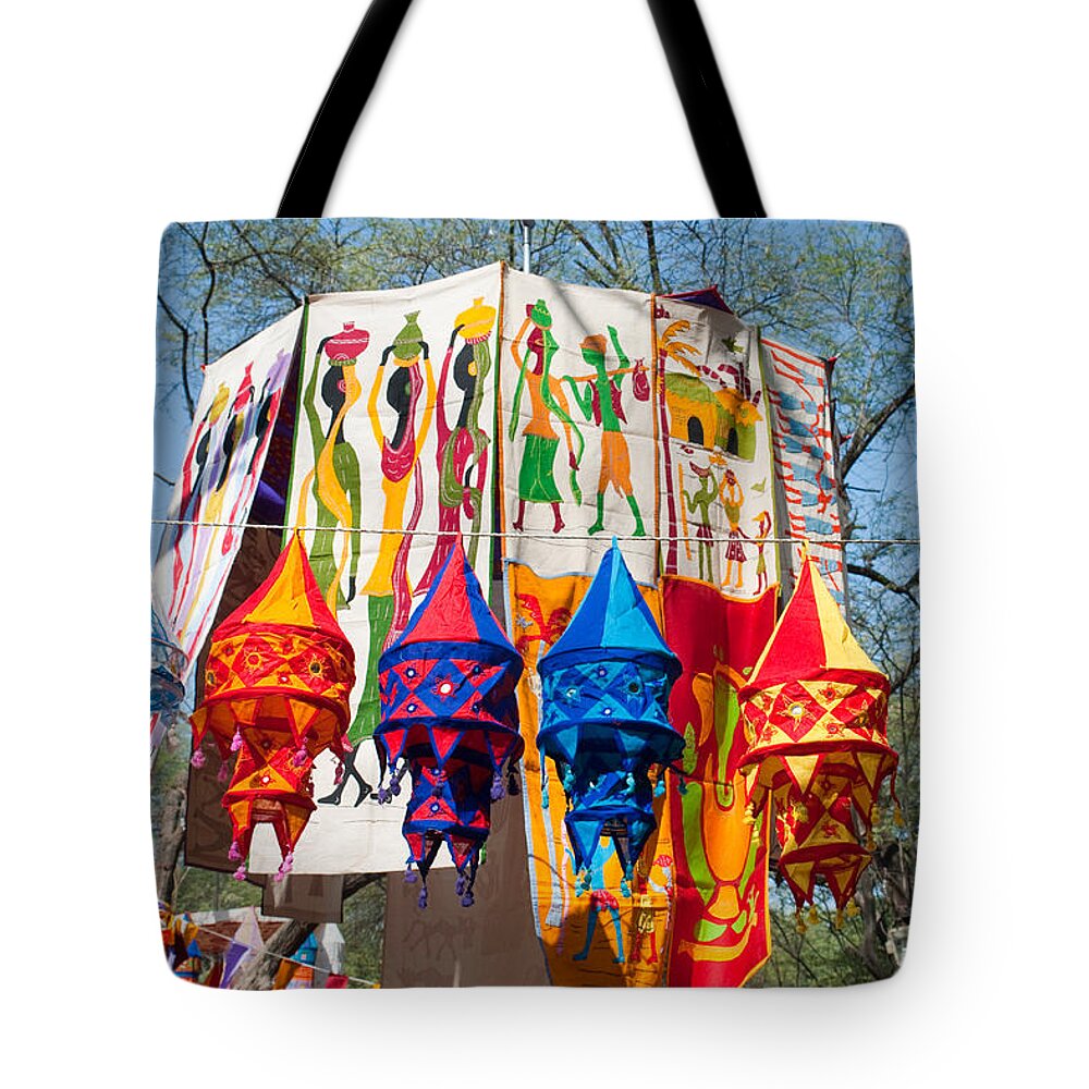 Banner Tote Bag featuring the photograph Colorful banners at Surajkund Mela by Ashish Agarwal