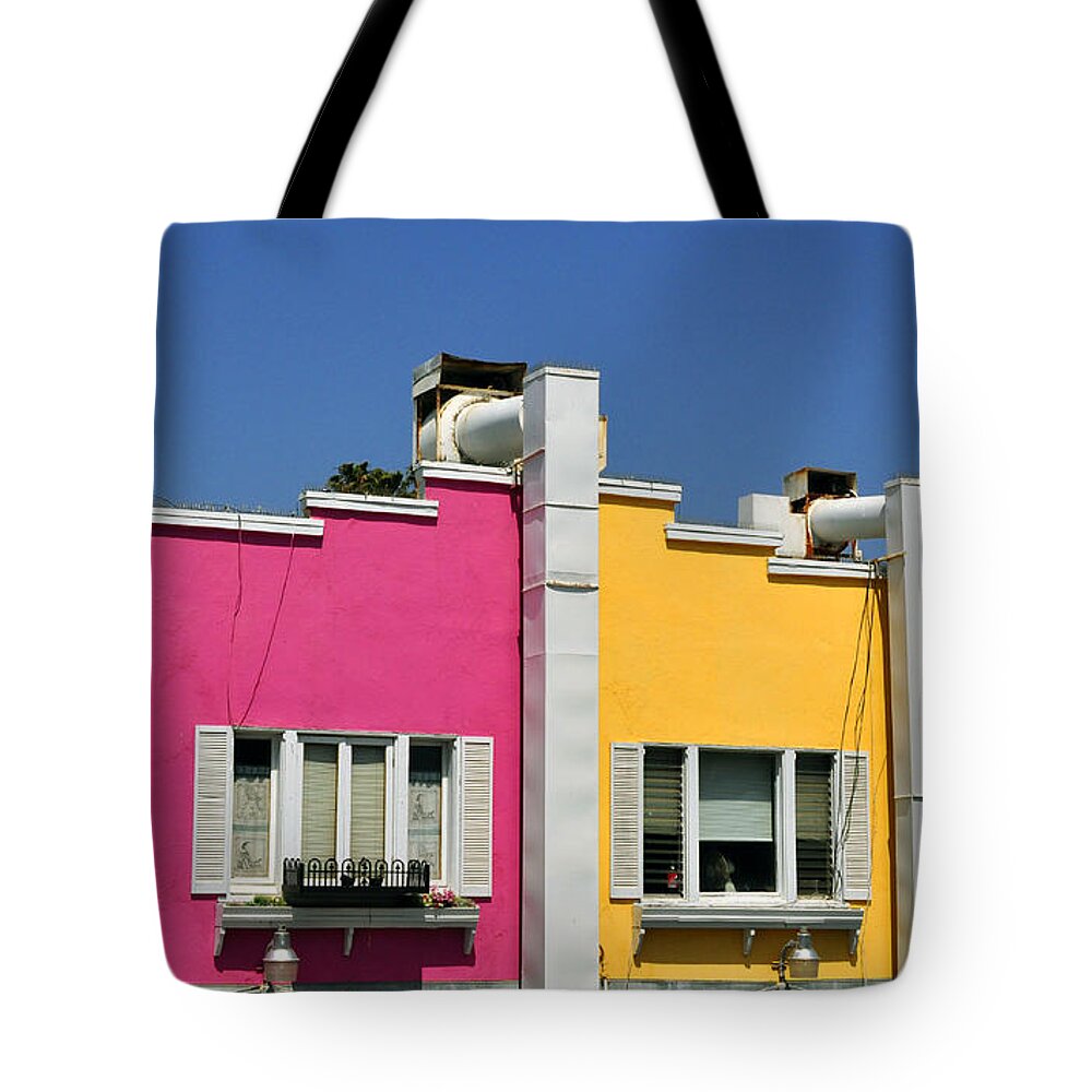 Clay Tote Bag featuring the photograph Colorful Seaside Shops by Clayton Bruster