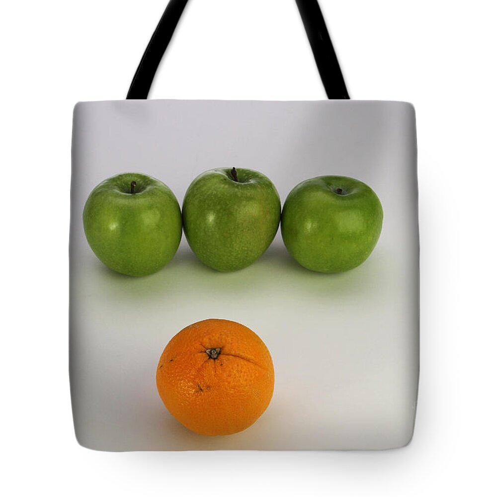 Fruit Tote Bag featuring the photograph Comparing Apples And Oranges by Photo Researchers, Inc.