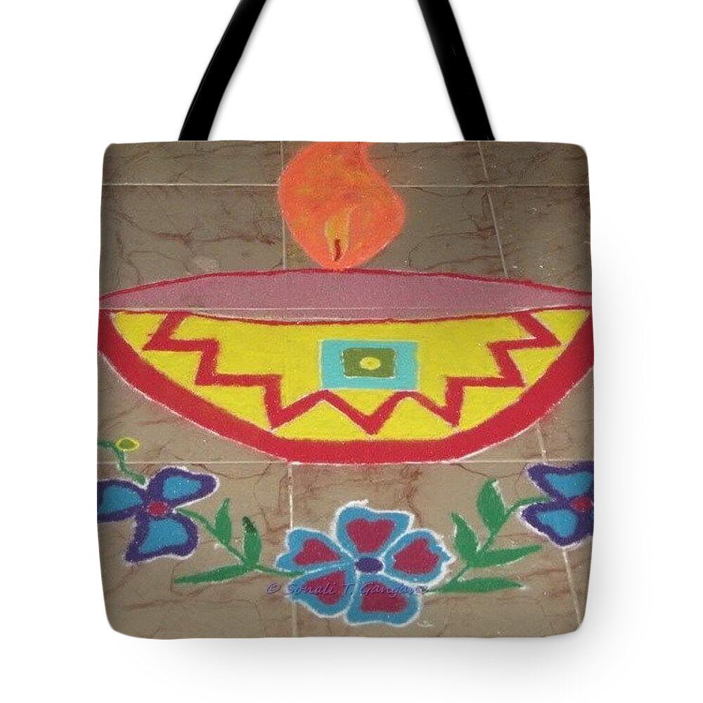 Colourful Diya Tote Bag featuring the drawing Decorative earthen Diya Rangoli by Sonali Gangane