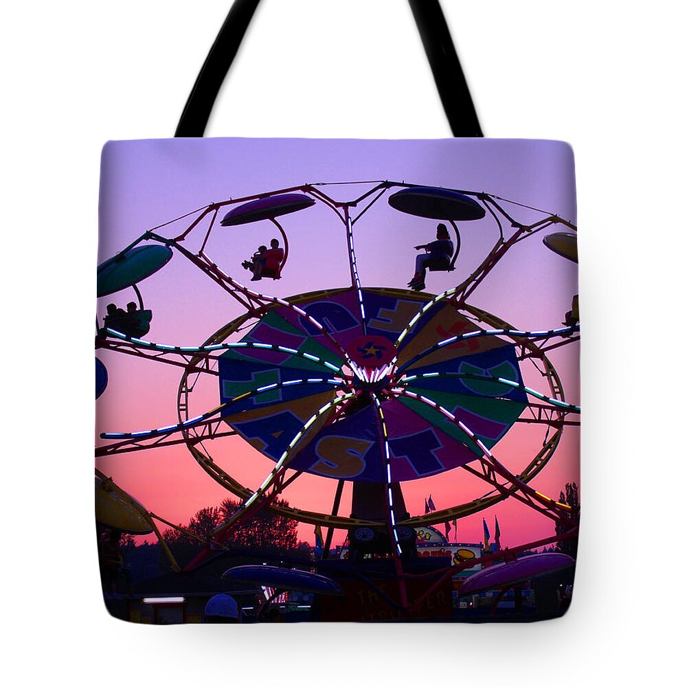 Amusement Park Rides Tote Bag featuring the photograph Fast Fun Ride At Sunset by Kym Backland