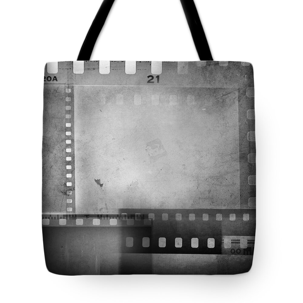 Grey Tote Bag featuring the photograph Film negatives by Les Cunliffe