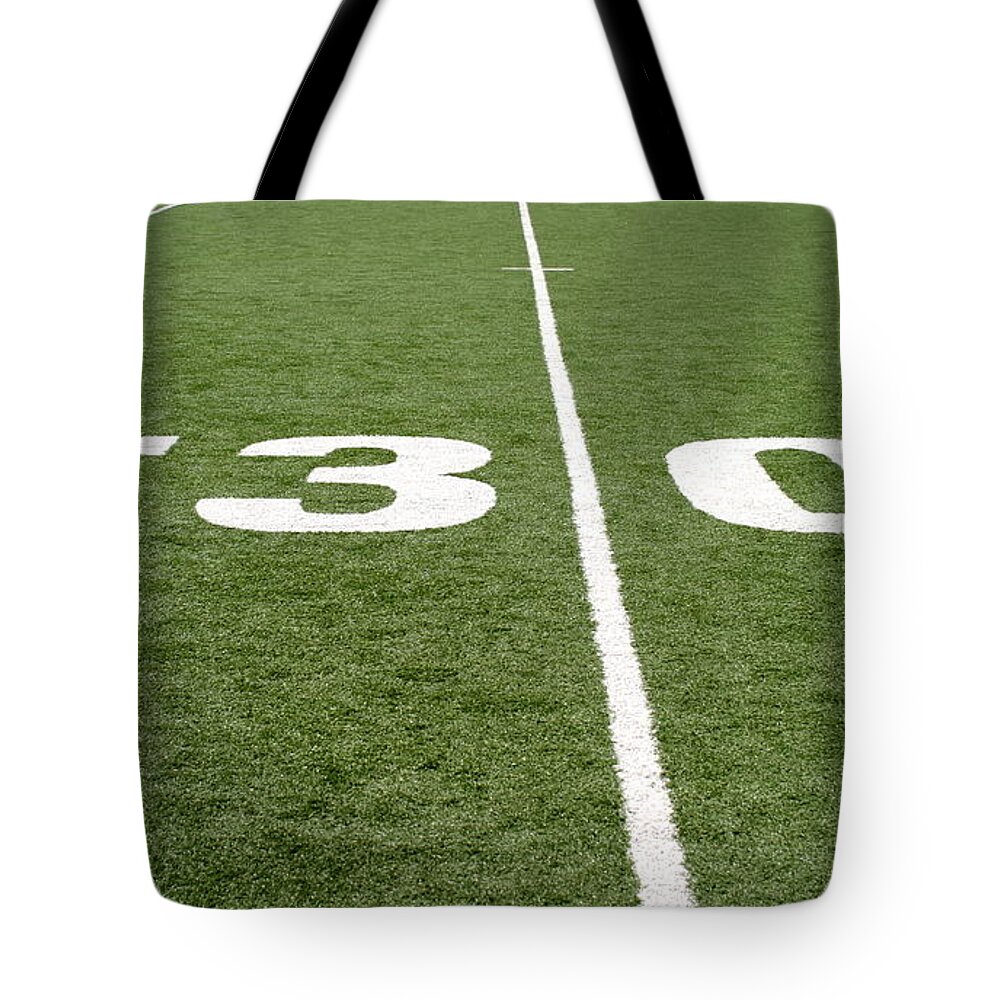 American Tote Bag featuring the photograph Football Field Thirty by Henrik Lehnerer