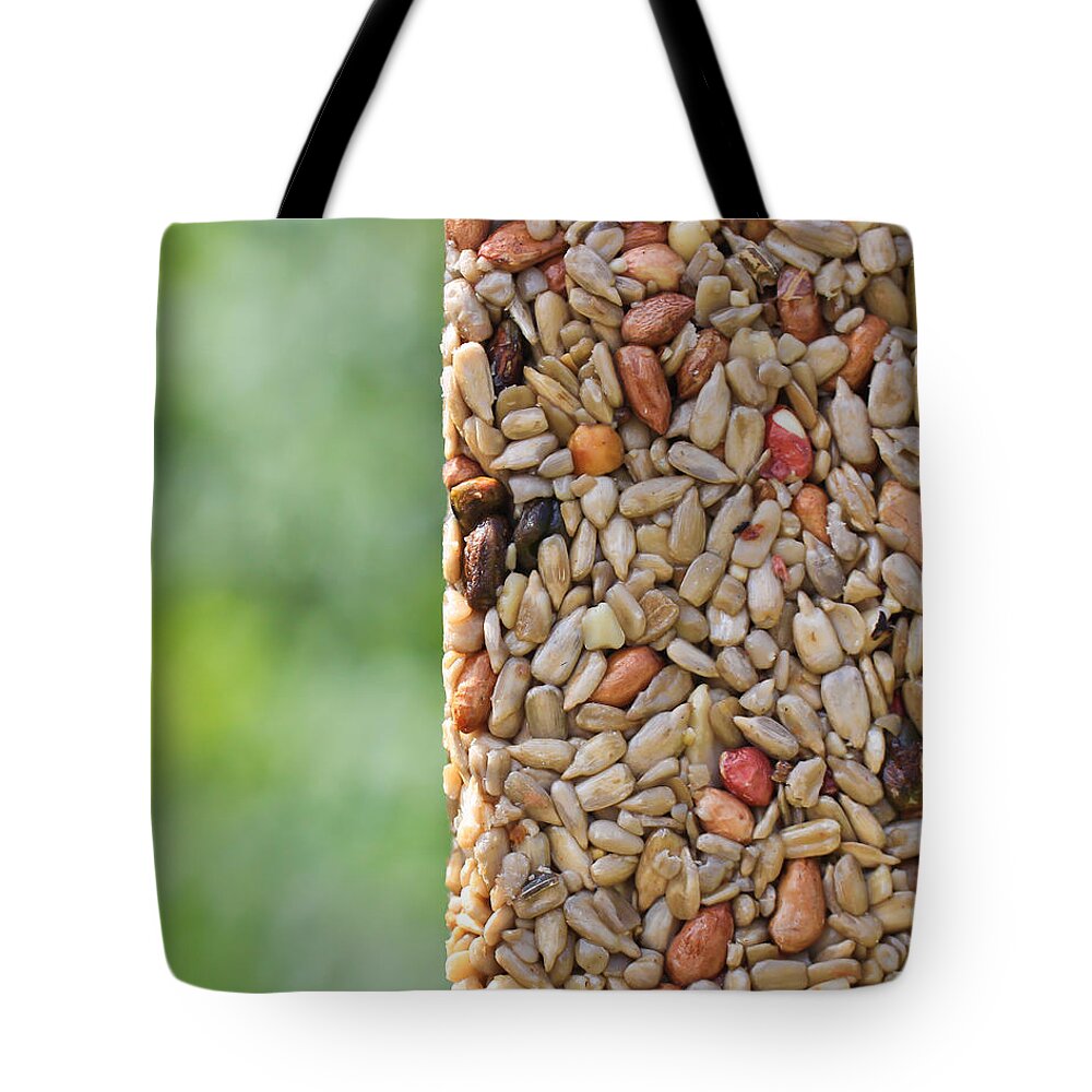 Seeds Tote Bag featuring the photograph For The Birds by Heidi Smith