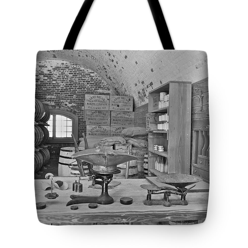 Antique Tote Bag featuring the photograph Fort Macon supply room BW 9071 by Michael Peychich