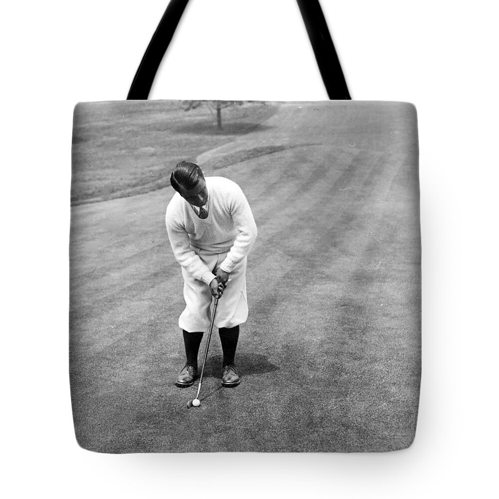 gene Sarazen Tote Bag featuring the photograph Gene Sarazen playing golf by International Images