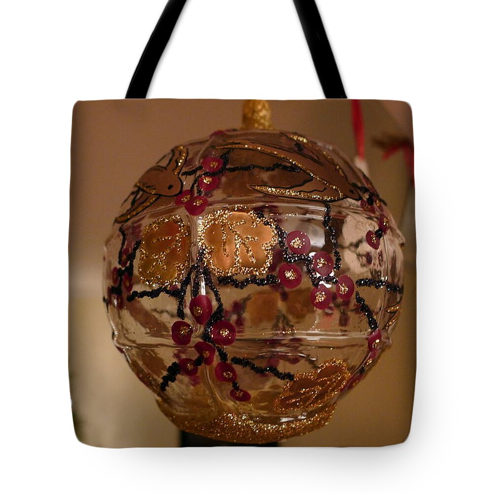 Glass Tote Bag featuring the photograph Glass Bauble by Richard Reeve