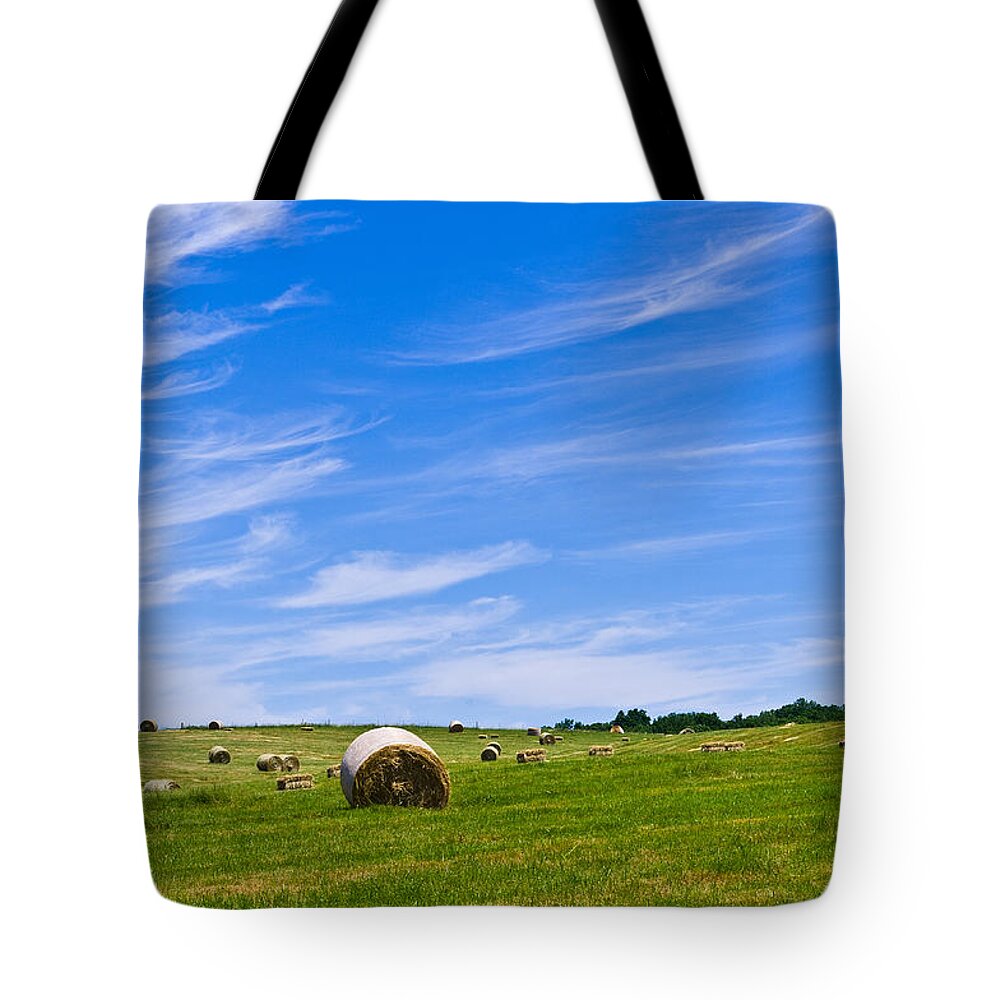 Bales Tote Bag featuring the photograph Hay Bales under Brilliant Blue Sky by Lori Coleman