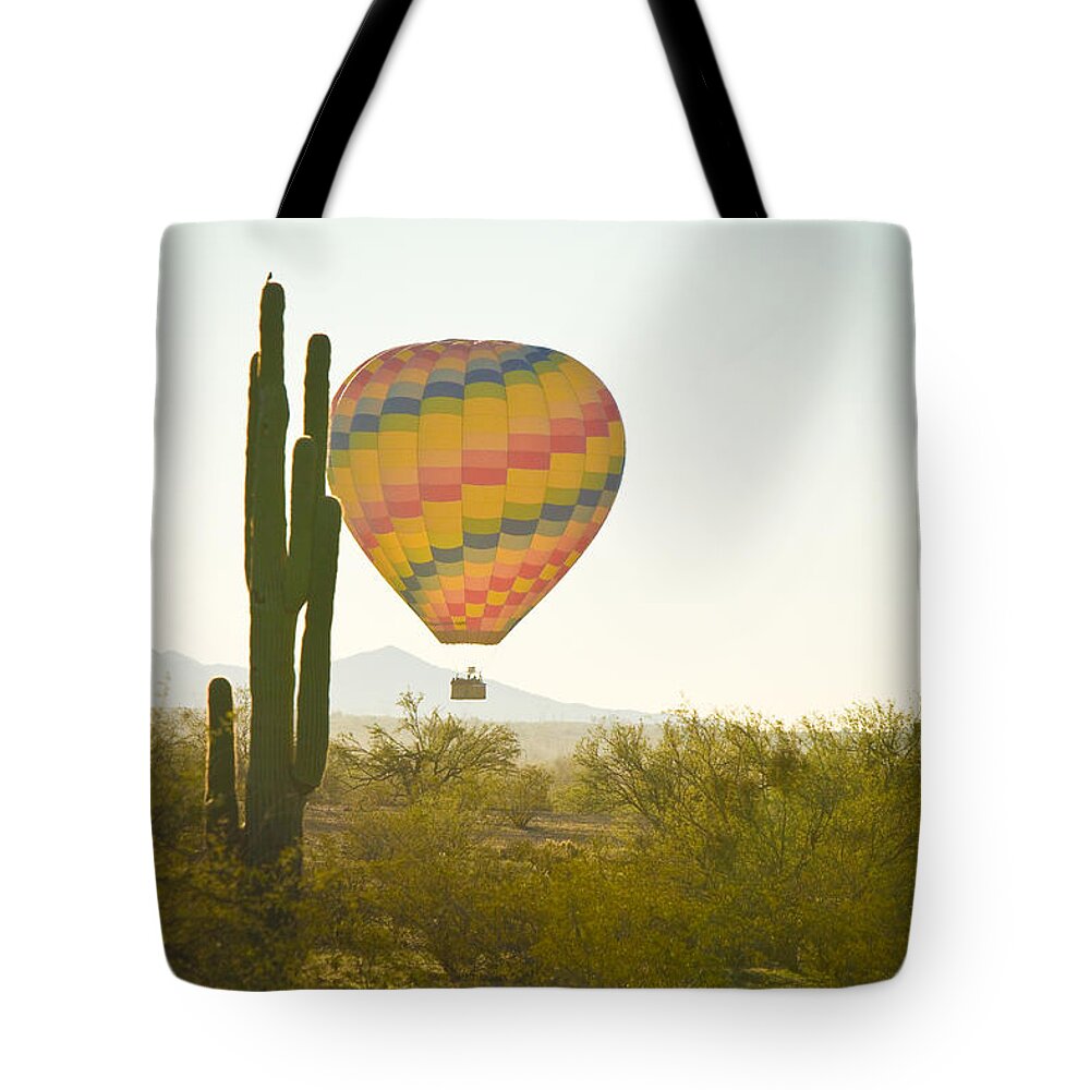 Arizona Tote Bag featuring the photograph Hot Air Balloon over the Arizona Desert With Giant Saguaro by James BO Insogna