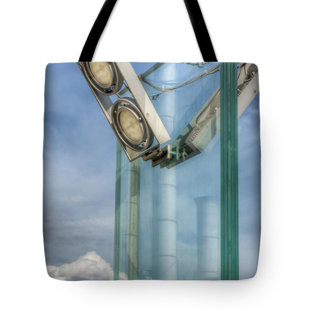 Hdr Tote Bag featuring the photograph Industrial reflection in a street lamp by Michael Goyberg