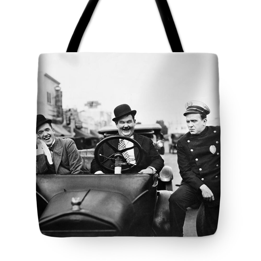 1920s Tote Bag featuring the photograph Laurel And Hardy, 1928 by Granger