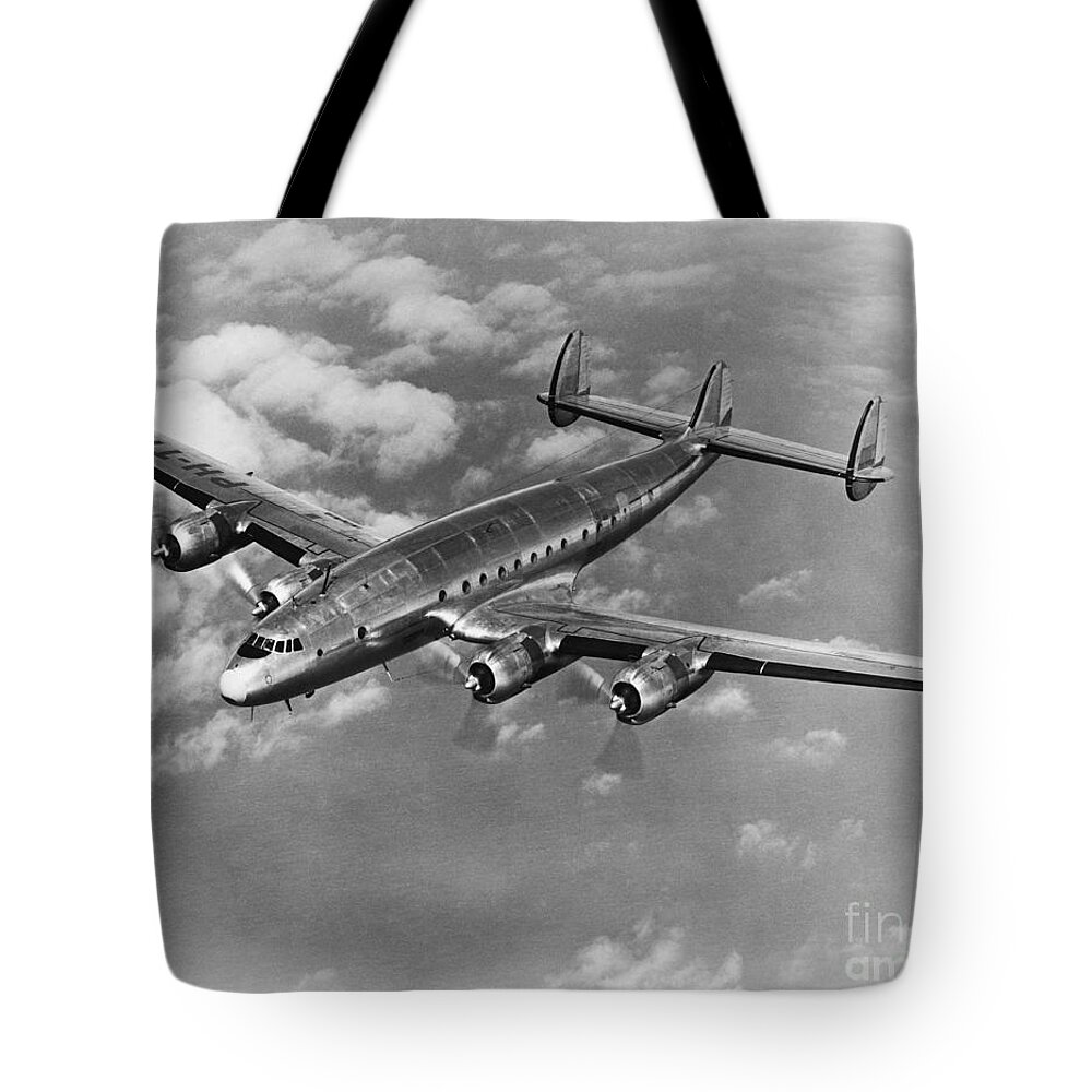 Historic Tote Bag featuring the photograph Lockheed Constellation by Photo Researchers