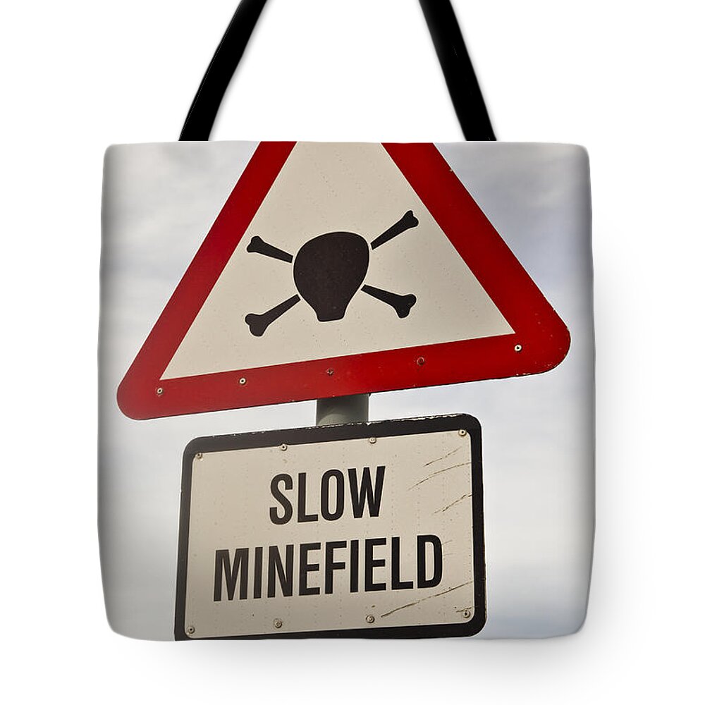 00479610 Tote Bag featuring the photograph Minefield Road Sign Falkland Islands by Colin Monteath