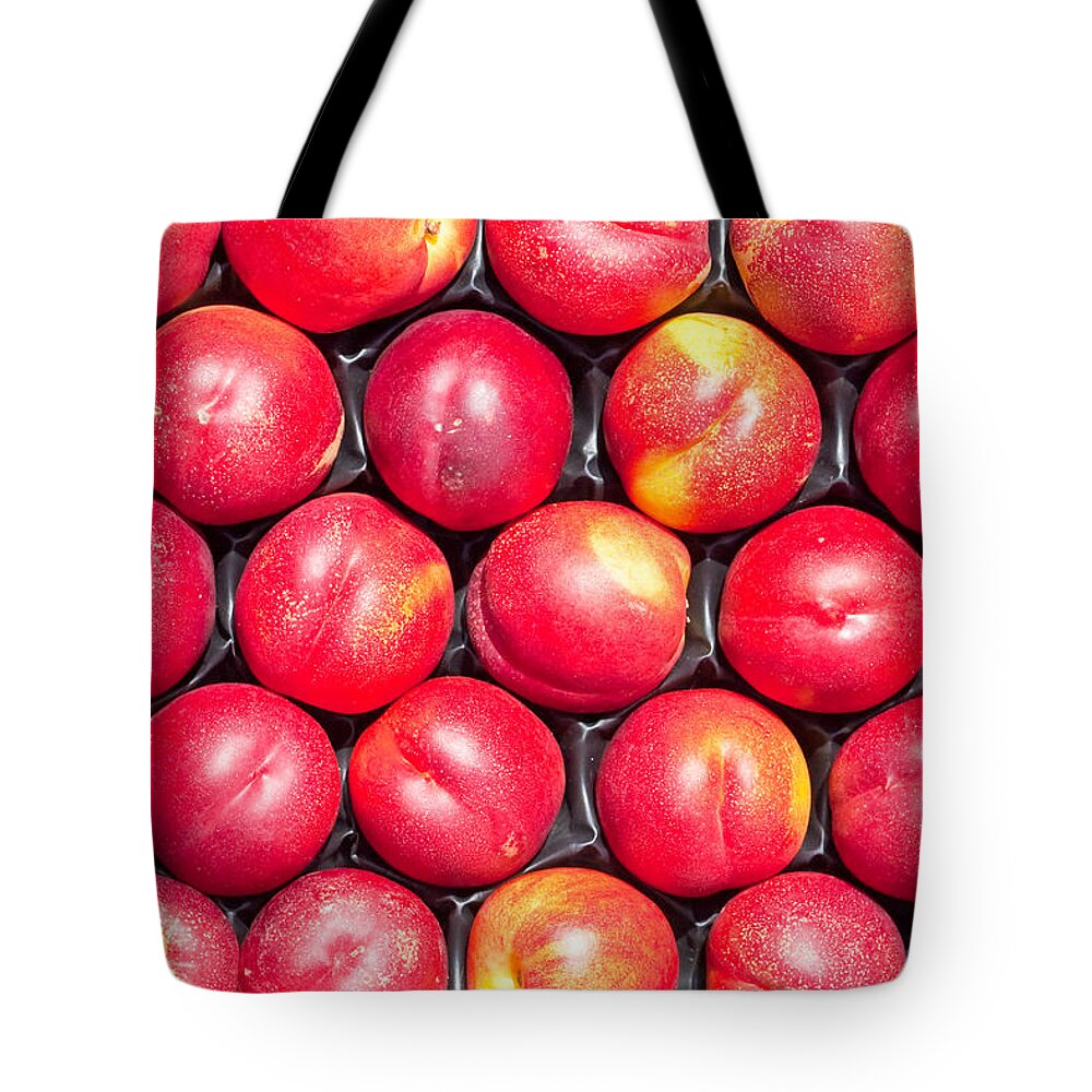 Agriculture Tote Bag featuring the photograph Nectarines by Tom Gowanlock