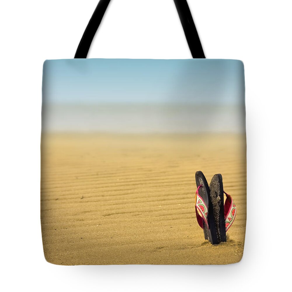 Beach Tote Bag featuring the photograph Nirvana by Evelina Kremsdorf