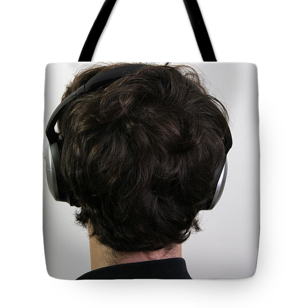 Person Tote Bag featuring the photograph Noise-canceling Headphones by Photo Researchers, Inc.