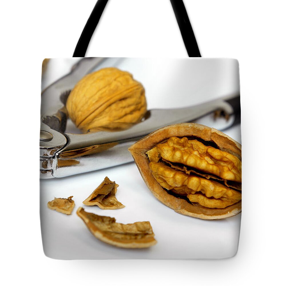 Autumn Tote Bag featuring the photograph Nut Cracker by Carlos Caetano