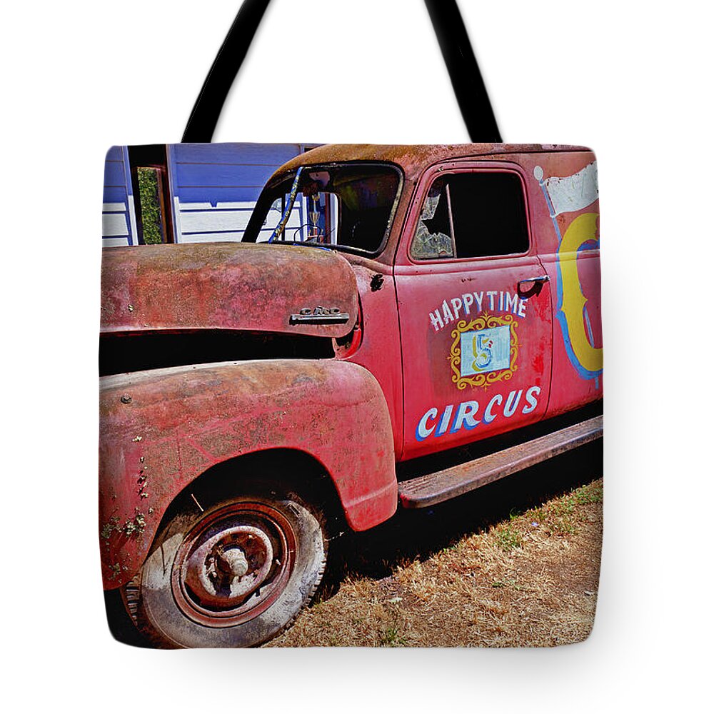 Red Tote Bag featuring the photograph Old circus truck by Garry Gay