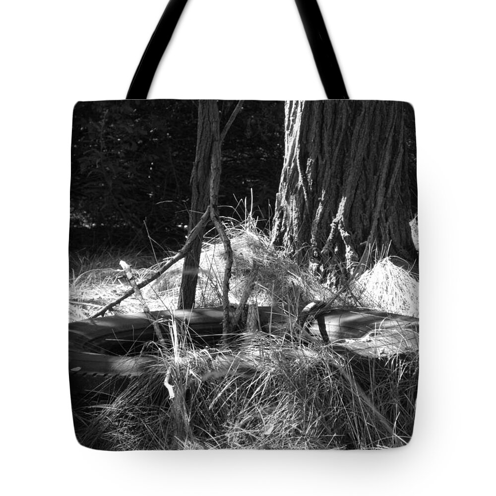 Black And White Tote Bag featuring the photograph Old Tire by Michele Nelson