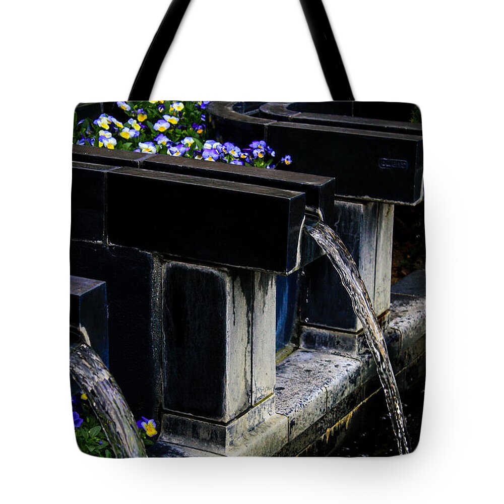 Water Tote Bag featuring the photograph Pansy Fountain by Toma Caul