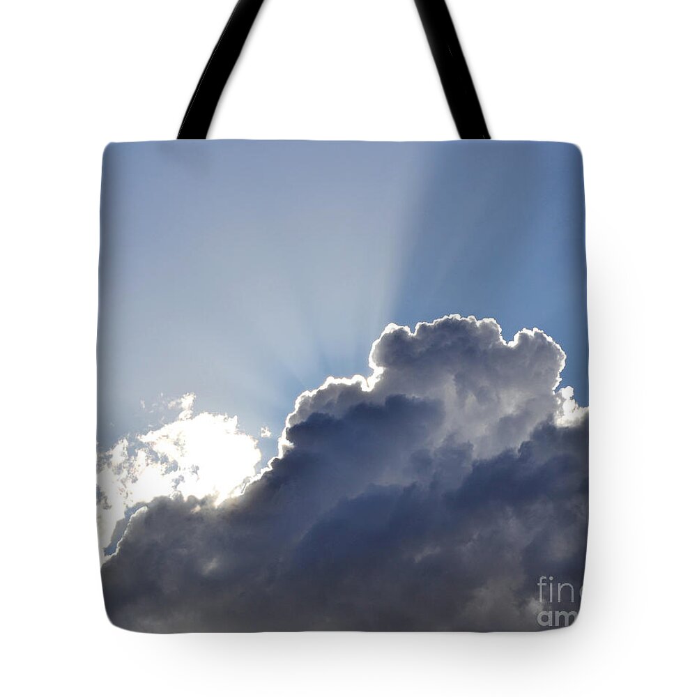 Clouds Tote Bag featuring the photograph Partly cloudy by Rebecca Margraf