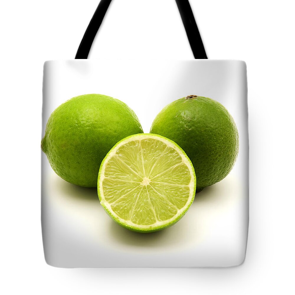 White Background Tote Bag featuring the photograph Persian lime by Fabrizio Troiani