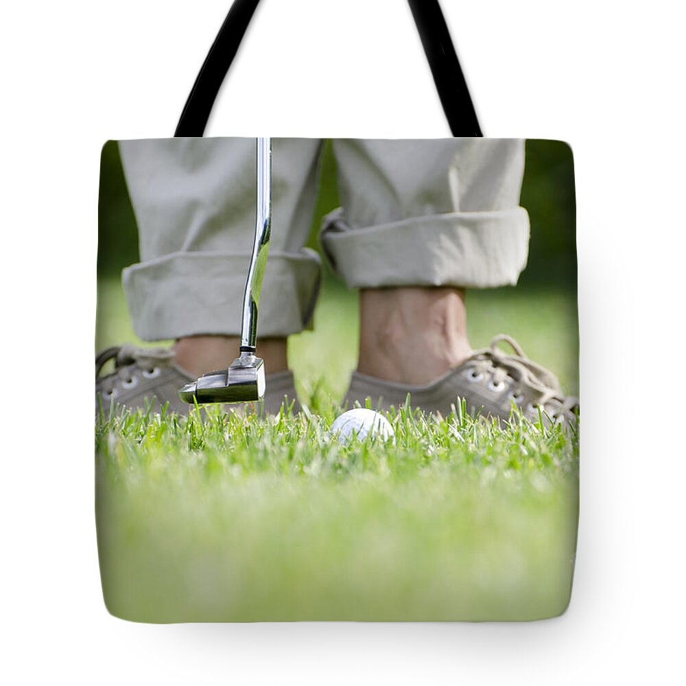Golf. Sport Tote Bag featuring the photograph Playing golf by Mats Silvan