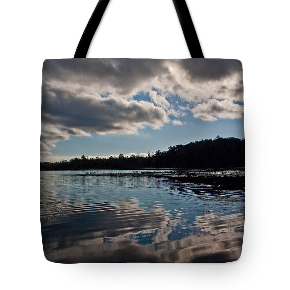Clouds Tote Bag featuring the photograph Reflections Of A Sunny Day by Greg DeBeck