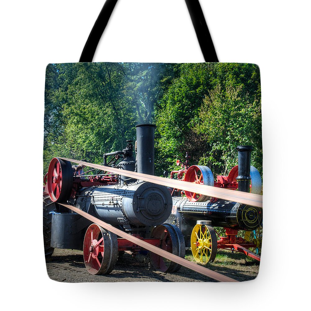 Arcadia Volunteer Fire Company Tote Bag featuring the photograph Rumley powers the Saw by Mark Dodd