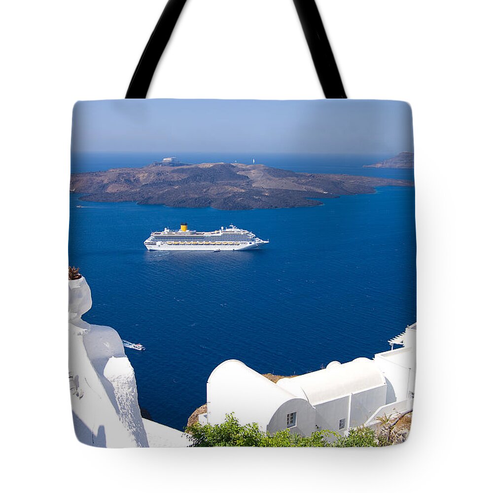 Aegean Tote Bag featuring the photograph Santorini Cruising by Meirion Matthias