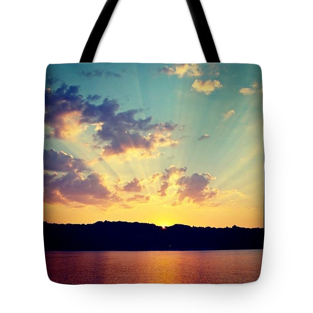 Bay Tote Bag featuring the photograph Setting Sun by Justin Connor
