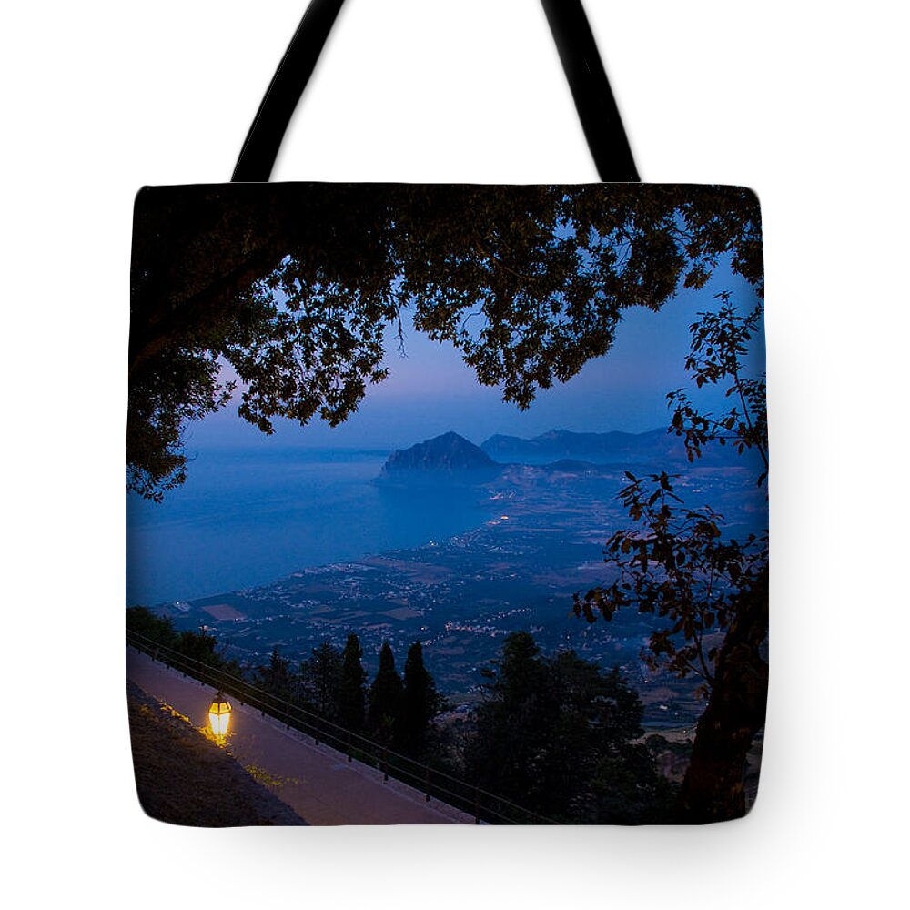 Dusk Sunset Landscape Sea Mediterranean Island Wide Panorama Light Latern Tote Bag featuring the photograph Sicilian dusk by Marco Busoni