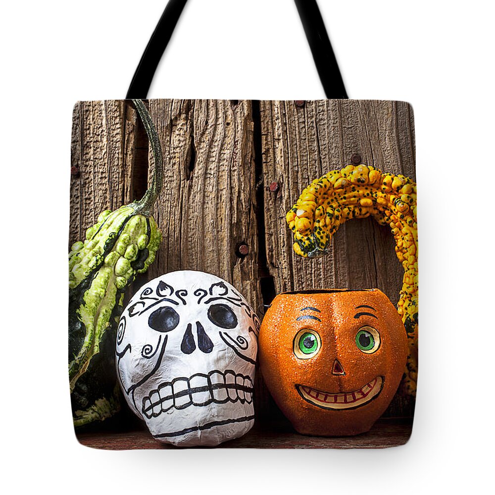 Skull Tote Bag featuring the photograph Skull and jack-O-lantern by Garry Gay