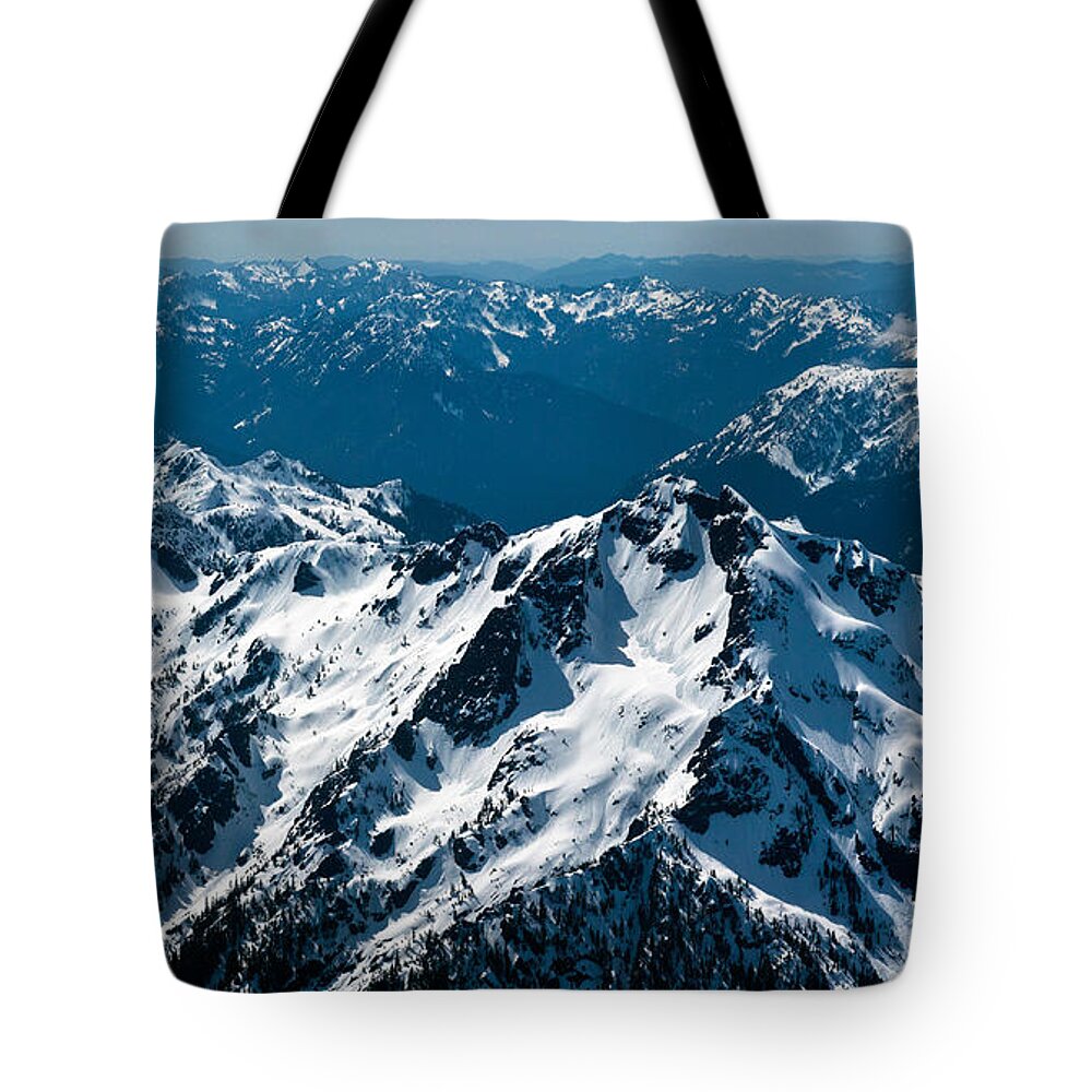 Olympic Mountains Tote Bag featuring the photograph Soaring Over the Olympics by Mike Reid