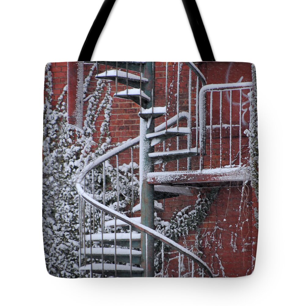 Staircase Tote Bag featuring the photograph Spiral Staircase with Snow and Cooper's Hawk by Ronald Grogan